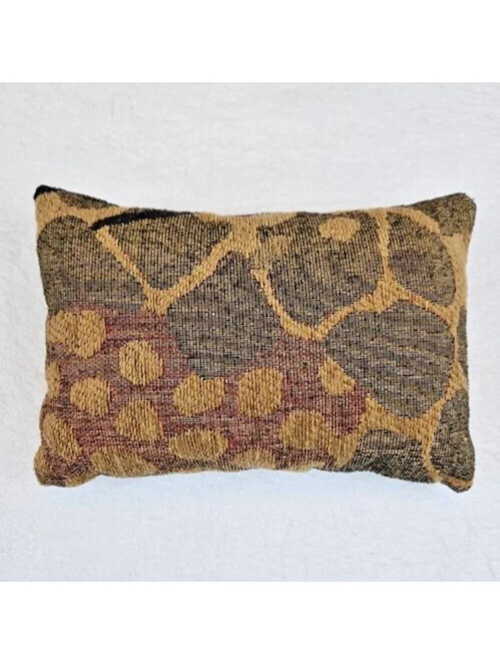 Woven Tapestry Accent Pillow (Unbranded) features and animal-print pattern.